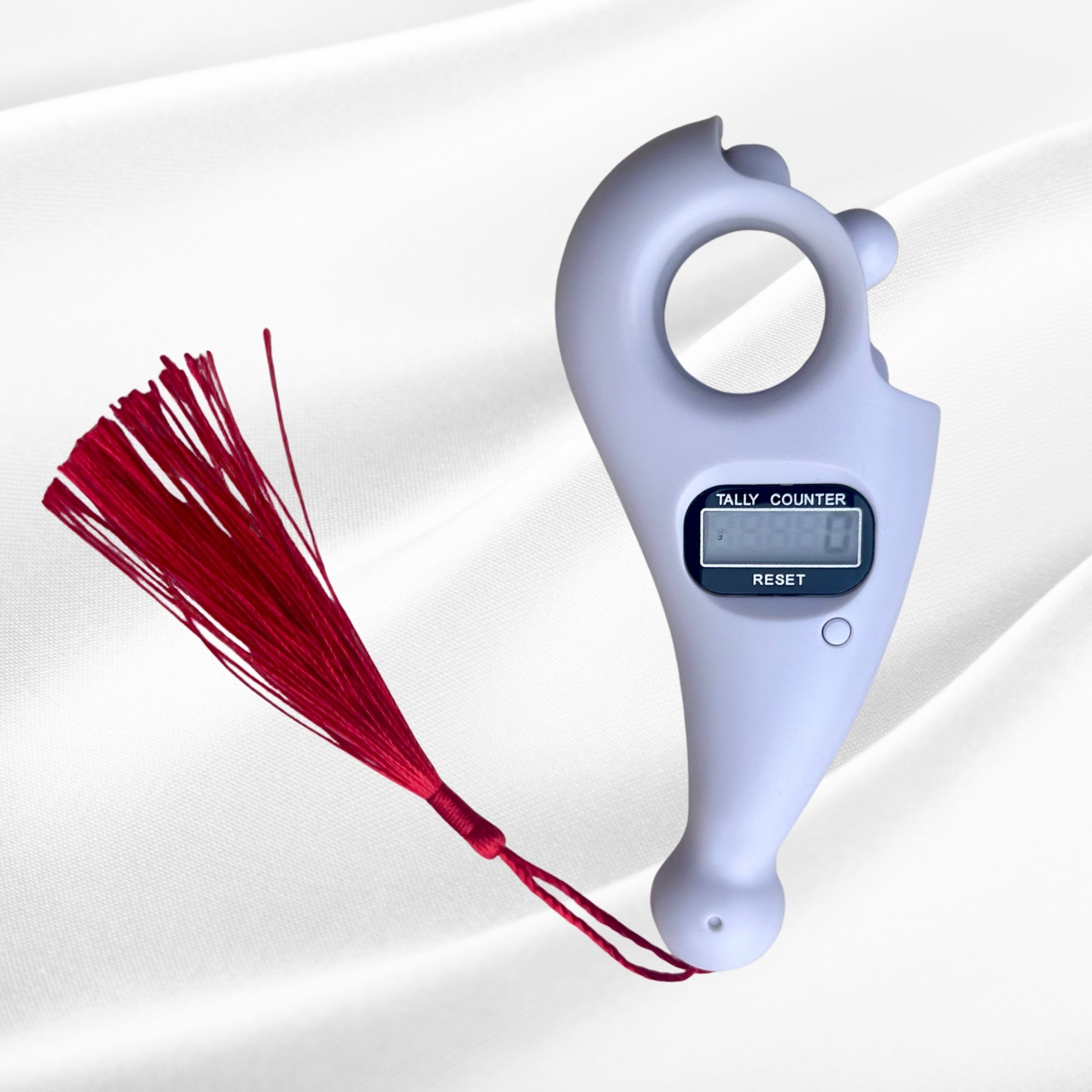 Digital tally counter with a red flogger on a white background